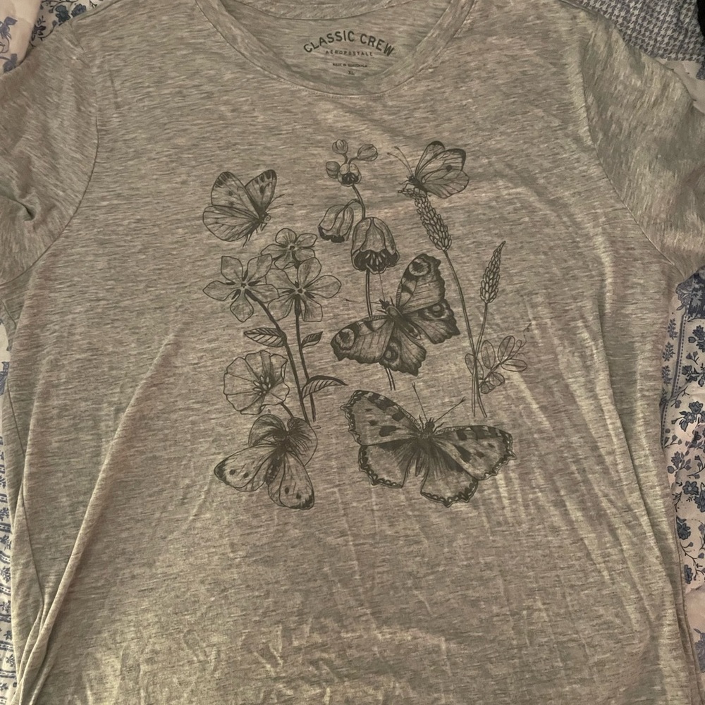 grey t shirt with butterflies